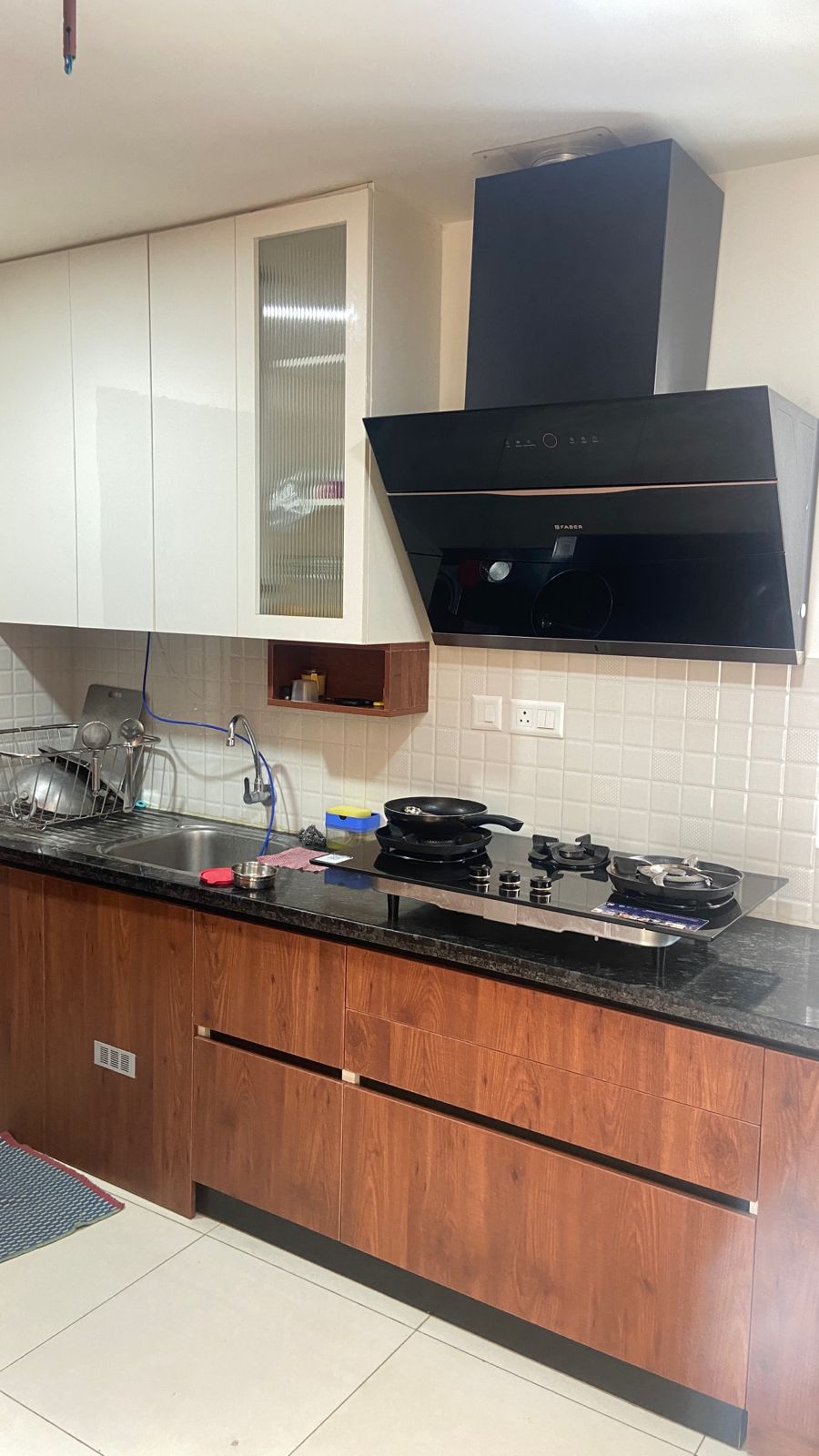 Completed modular kitchen in Chennai showing specified material grades
