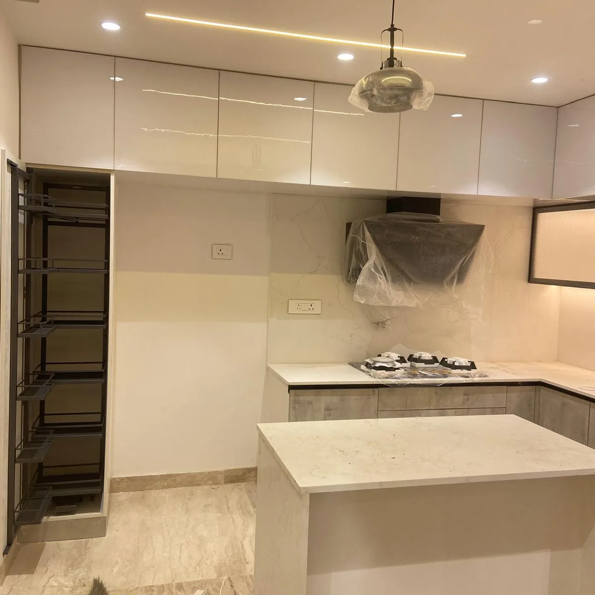 Aditya Empress apartment interiors in Hyderabad by AlcorOne Solutions — Modular kitchen &amp; tall units
