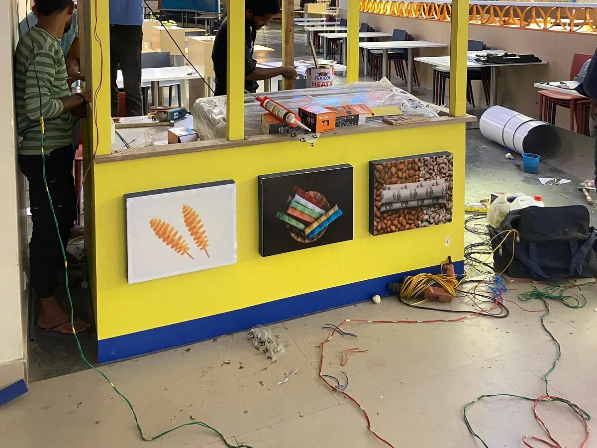 Madurai Famous Jigarthanda kiosk fit-out in Chennai by AlcorOne Solutions — Backlit counter panels installed