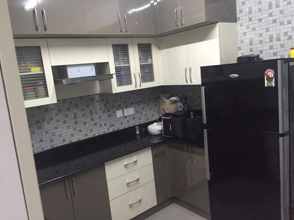 Ozone home interiors in Chennai by AlcorOne Solutions — Modular kitchen