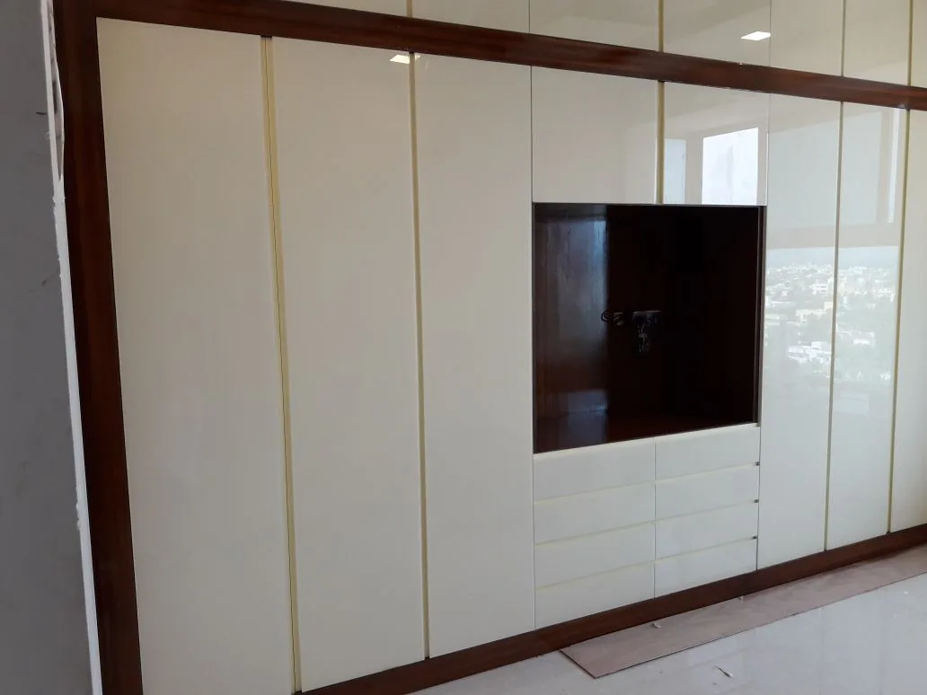 Ozone home interiors in Chennai by AlcorOne Solutions — Wardrobe &amp; TV unit