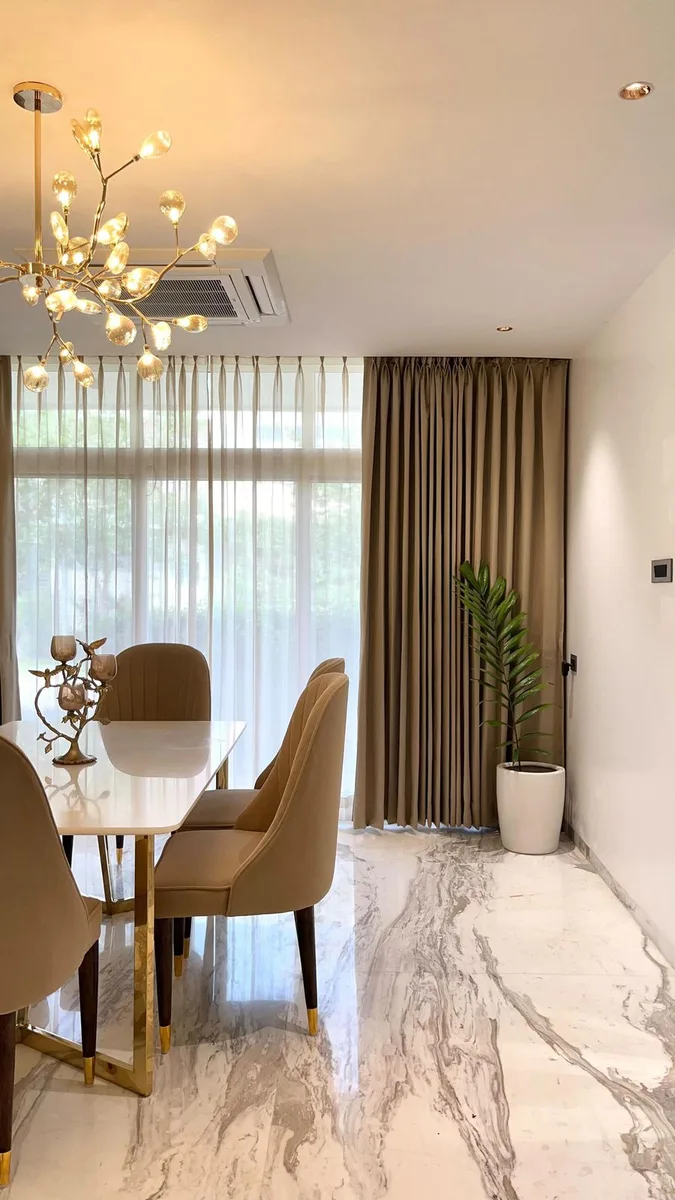 Serene 3BHK Residence interior in Hyderabad by AlcorOne Solutions — Dining area