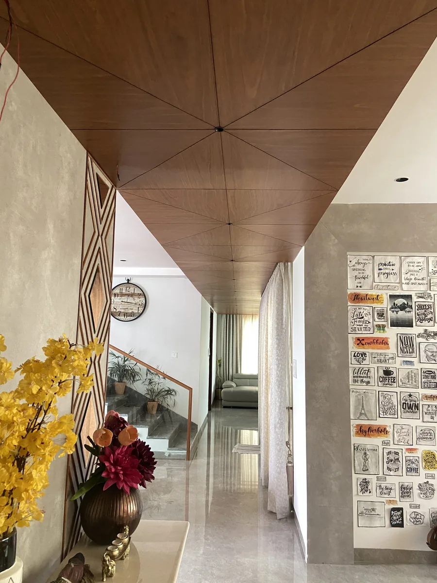 Villa interior in Hyderabad by AlcorOne Solutions — Foyer &amp; veneer ceiling