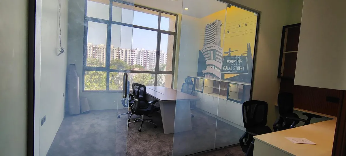 Vridhi office interiors in Chennai by AlcorOne Solutions — Glass cabin