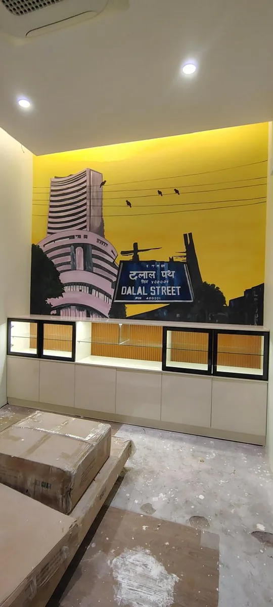 Vridhi office interiors in Chennai by AlcorOne Solutions — Dalal Street feature wall