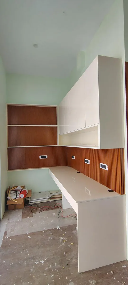 Vridhi office interiors in Chennai by AlcorOne Solutions — L-shaped workstation
