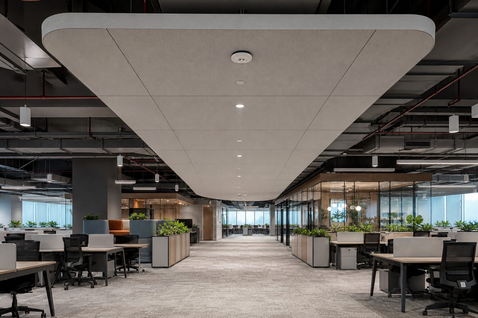 Sculptural suspended acoustic raft over exposed services
