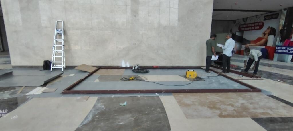 Ladder and floor guard in position as frame assembly begins