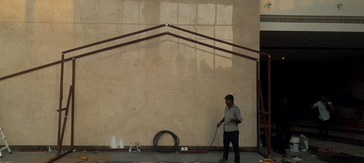Gable frame outline erected at the kiosk position