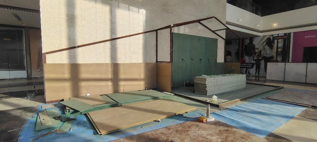 Flooring materials delivered and staged inside the work area
