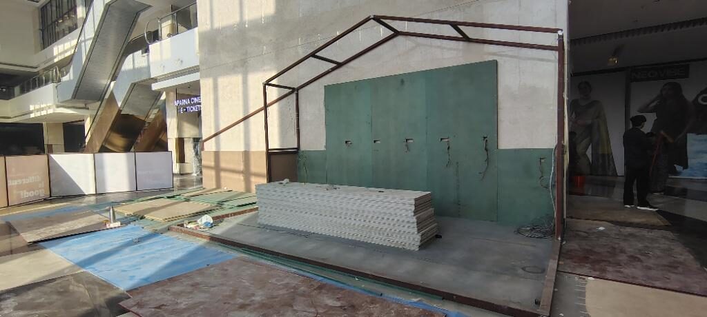 End-of-week state: boarded frame, protected floor and staged materials